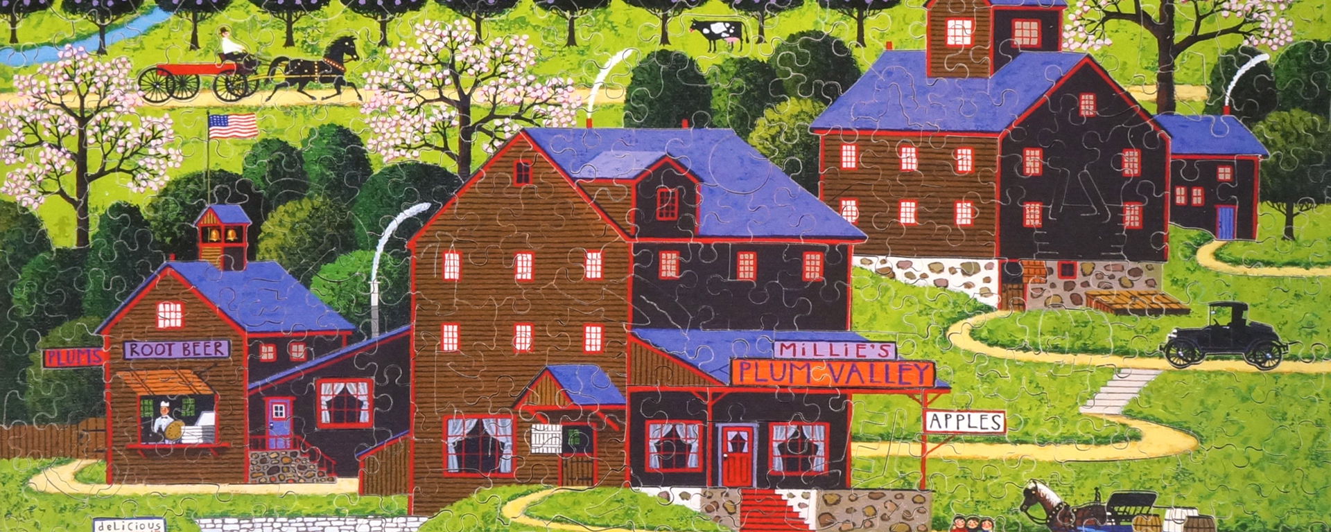 Wooden Americana puzzle illustrating a country town in the past with wooden shops and horse drawn carriages on dirt roads.